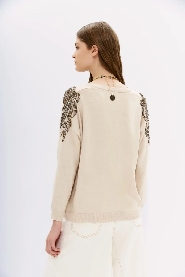 sweater coraline